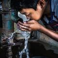 water drinking boy