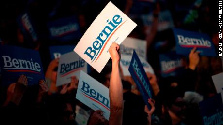 Supporters of Democratic presidential hopeful Vermont Senator Bernie Sanders cheer during a rally at Houston University in Houston, Texas on February 23, 2020. 